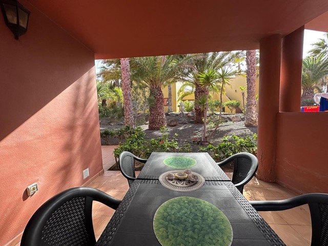 Terrace table looking out into the palm gardens