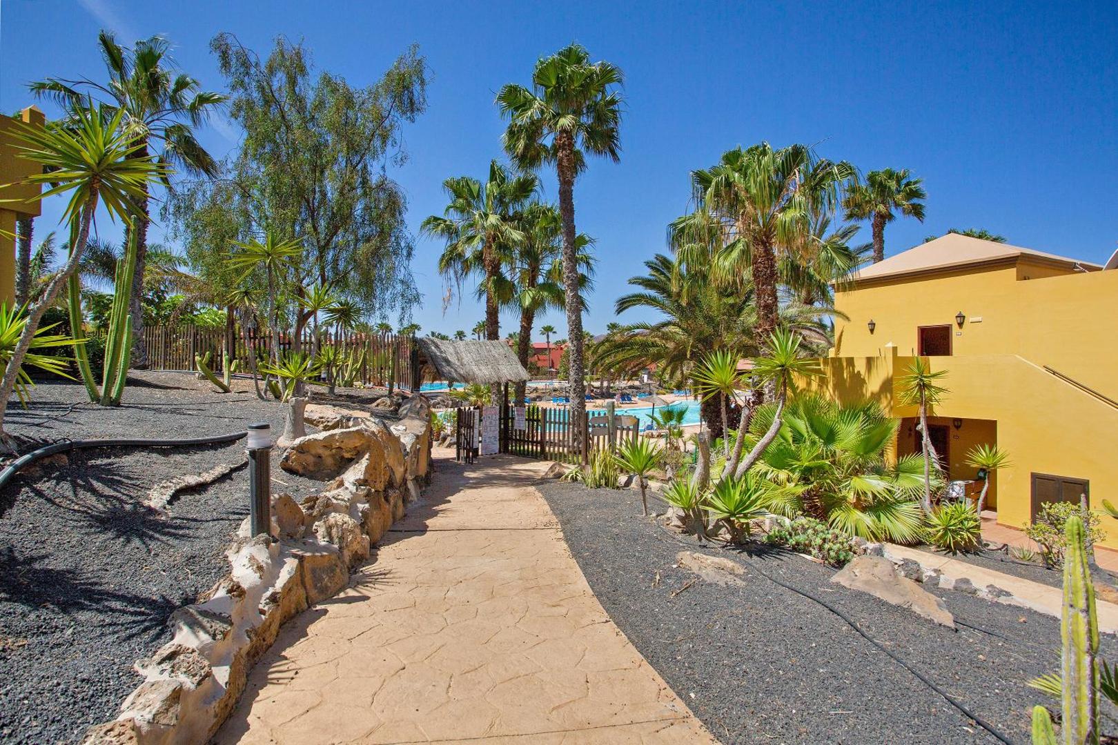 The resort buildings and pool